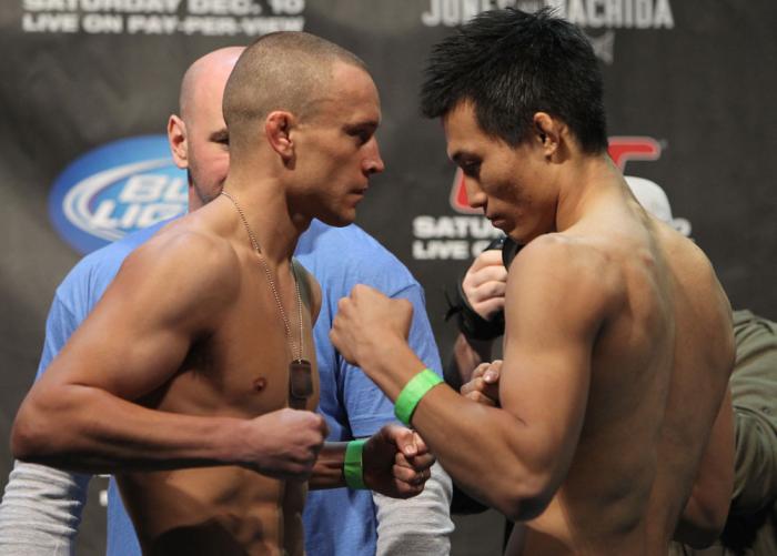 TORONTO, ON - DECEMBER 09: (L-R) Featherweight opponents Mark Hominick and Chan Sung Jung face off after weighing in during the UFC 140 Official Weigh-in at the Air Canada Centre on December 9, 2011 in Toronto, Canada. (Photo by Josh Hedges/Zuffa LLC/Zu