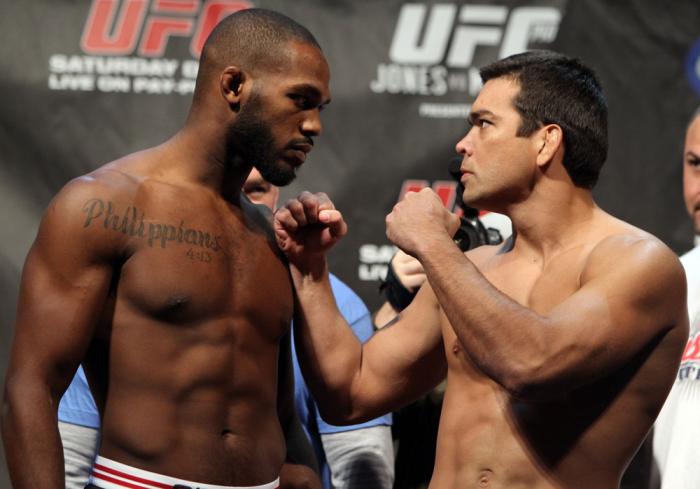 TORONTO, ON - DECEMBER 09: (L-R) UFC Light Heavyweight Champion Jon "Bones" Jones and challenger Lyoto Machida face off after weighing in during the UFC 140 Official Weigh-in at the Air Canada Centre on December 9, 2011 in Toronto, Canada. (Photo by Jos