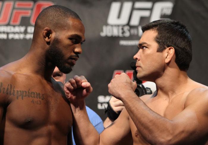TORONTO, ON - DECEMBER 09: (L-R) UFC Light Heavyweight Champion Jon "Bones" Jones and challenger Lyoto Machida face off after weighing in during the UFC 140 Official Weigh-in at the Air Canada Centre on December 9, 2011 in Toronto, Canada. (Photo by Jos