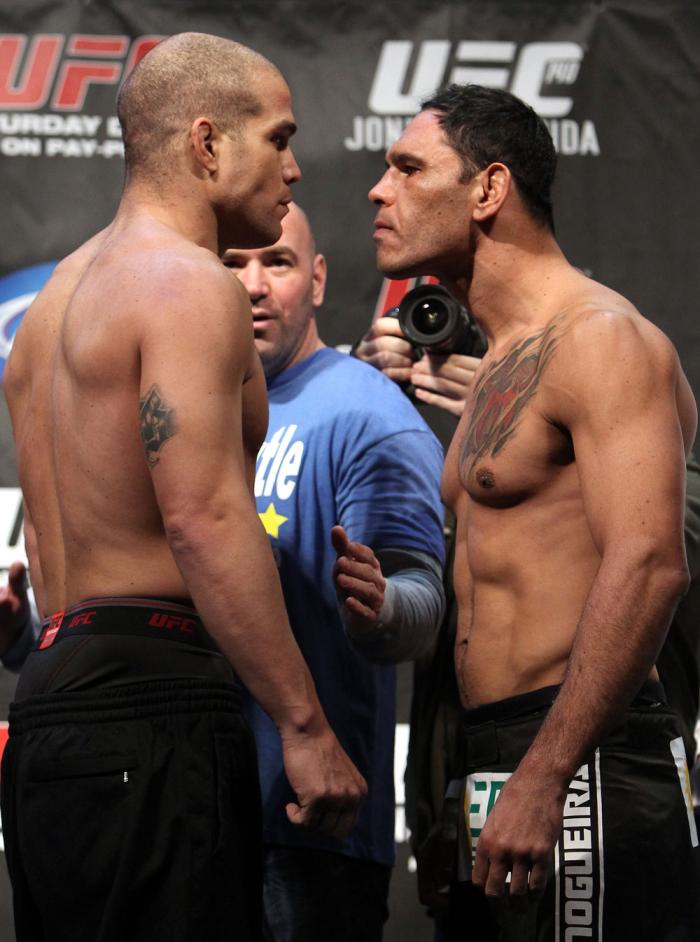 TORONTO, ON - DECEMBER 09: (L-R) Light Heavyweight opponents Tito Ortiz and Antonio Rogerio "Minotoro" Nogueira face off after weighing in during the UFC 140 Official Weigh-in at the Air Canada Centre on December 9, 2011 in Toronto, Canada. (Photo by Jo
