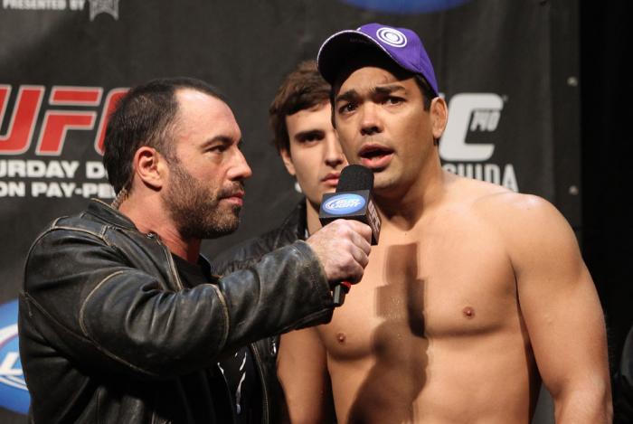 TORONTO, ON - DECEMBER 09: (R-L) UFC Light Heavyweight title challenger Lyoto Machida is interviewed by Joe Rogan after the UFC 140 Official Weigh-in at the Air Canada Centre on December 9, 2011 in Toronto, Canada. (Photo by Josh Hedges/Zuffa LLC/Zuffa