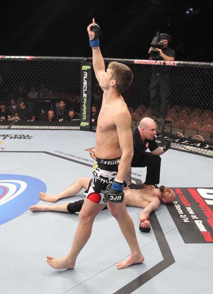 LAS VEGAS, NV - FEBRUARY 04: Stephen Thompson (center) reacts to his knockout victory over Dan Stittgen during the UFC 143 event at Mandalay Bay Events Center on February 4, 2012 in Las Vegas, Nevada. (Photo by Nick Laham/Zuffa LLC/Zuffa LLC via Getty I