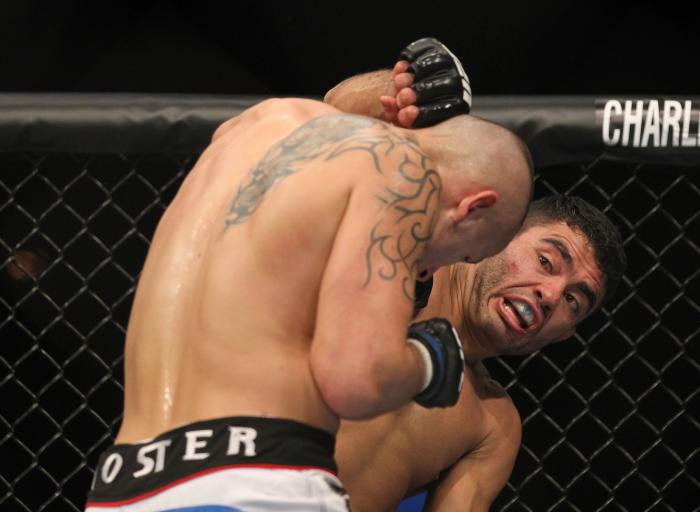 LAS VEGAS, NV - FEBRUARY 04: Rafael Natal (right) punches Michael Kuiper during the UFC 143 event at Mandalay Bay Events Center on February 4, 2012 in Las Vegas, Nevada. (Photo by Josh Hedges/Zuffa LLC/Zuffa LLC via Getty Images) *** Local Caption *** R