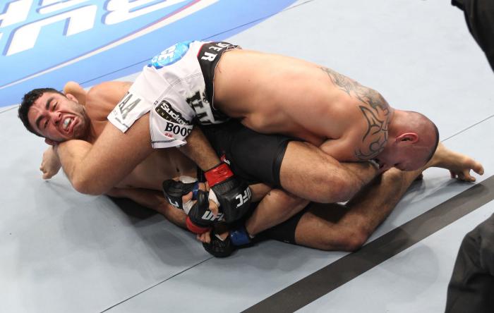 LAS VEGAS, NV - FEBRUARY 04: Rafael Natal (left) attempts to submit Michael Kuiper during the UFC 143 event at Mandalay Bay Events Center on February 4, 2012 in Las Vegas, Nevada. (Photo by Nick Laham/Zuffa LLC/Zuffa LLC via Getty Images) *** Local Capt