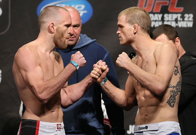 TORONTO, CANADA - SEPTEMBER 21: (L-R) Opponents T.J. Grant and Evan Dunham face off during the UFC 152 weigh in at Mattamy Athletic Centre at the Gardens on September 21, 2012 in Toronto, Ontario, Canada. (Photo by Josh Hedges/Zuffa LLC/Zuffa LLC via Gett