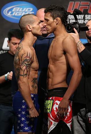 TORONTO, CANADA - SEPTEMBER 21: (L-R) Opponents Cub Swanson and Charles Oliveira face off during the UFC 152 weigh in at Mattamy Athletic Centre at the Gardens on September 21, 2012 in Toronto, Ontario, Canada. (Photo by Josh Hedges/Zuffa LLC/Zuffa LLC vi