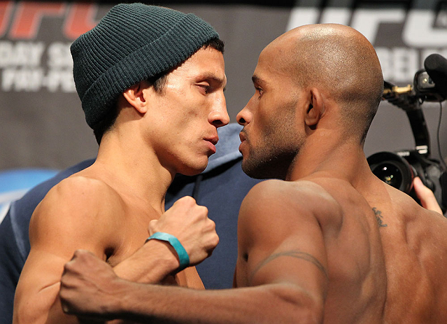 TORONTO, CANADA - SEPTEMBER 21: (L-R) Opponents Joseph Benavidez and Demetrious Johnson face off during the UFC 152 weigh in at Mattamy Athletic Centre at the Gardens on September 21, 2012 in Toronto, Ontario, Canada. (Photo by Mike Roach/Zuffa LLC/Zuffa