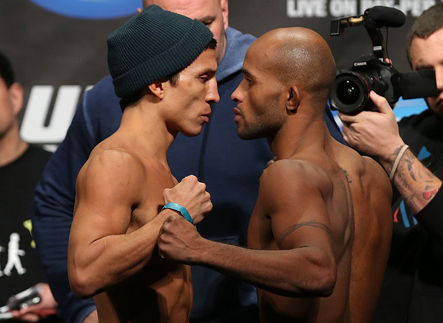 TORONTO, CANADA - SEPTEMBER 21: (L-R) Opponents Joseph Benavidez and Demetrious Johnson face off during the UFC 152 weigh in at Mattamy Athletic Centre at the Gardens on September 21, 2012 in Toronto, Ontario, Canada. (Photo by Josh Hedges/Zuffa LLC/Zuffa
