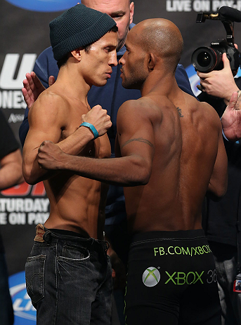 TORONTO, CANADA - SEPTEMBER 21: (L-R) Opponents Joseph Benavidez and Demetrious Johnson face off during the UFC 152 weigh in at Mattamy Athletic Centre at the Gardens on September 21, 2012 in Toronto, Ontario, Canada. (Photo by Josh Hedges/Zuffa LLC/Zuffa