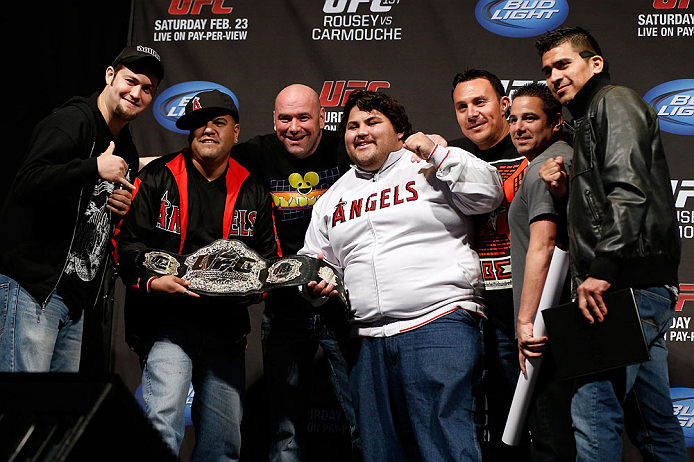 ANAHEIM, CA - FEBRUARY 22: UFC President Dana White poses for photos with fans during a Q&A session before the UFC 157 weigh-in at Honda Center on February 22, 2013 in Anaheim, California. (Photo by Josh Hedges/Zuffa LLC/Zuffa LLC via Getty Images)