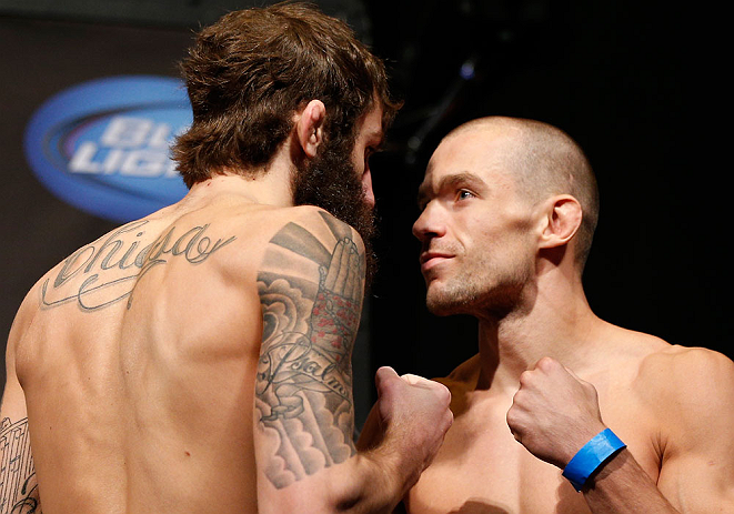 ANAHEIM, CA - FEBRUARY 22: (L-R) Opponents Michael Chiesa and Anton Kuivanen face off during the UFC 157 weigh-in at Honda Center on February 22, 2013 in Anaheim, California. (Photo by Josh Hedges/Zuffa LLC/Zuffa LLC via Getty Images)