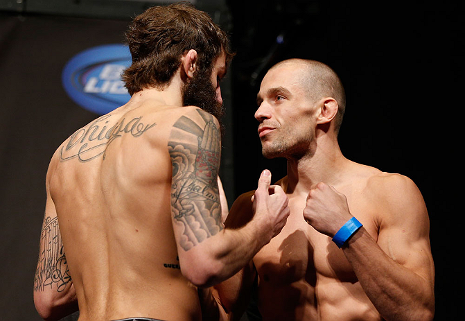 ANAHEIM, CA - FEBRUARY 22: (L-R) Opponents Michael Chiesa and Anton Kuivanen face off during the UFC 157 weigh-in at Honda Center on February 22, 2013 in Anaheim, California. (Photo by Josh Hedges/Zuffa LLC/Zuffa LLC via Getty Images)
