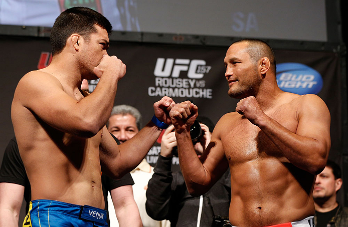 ANAHEIM, CA - FEBRUARY 22: (L-R) Opponents Lyoto Machida and Dan Henderson face off during the UFC 157 weigh-in at Honda Center on February 22, 2013 in Anaheim, California. (Photo by Josh Hedges/Zuffa LLC/Zuffa LLC via Getty Images)