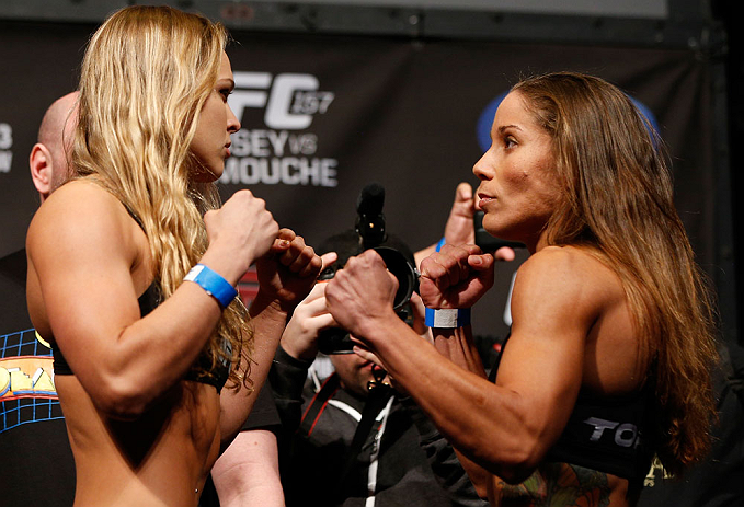 ANAHEIM, CA - FEBRUARY 22: (L-R) Opponents Ronda Rousey and Liz Carmouche face off during the UFC 157 weigh-in at Honda Center on February 22, 2013 in Anaheim, California. (Photo by Josh Hedges/Zuffa LLC/Zuffa LLC via Getty Images)