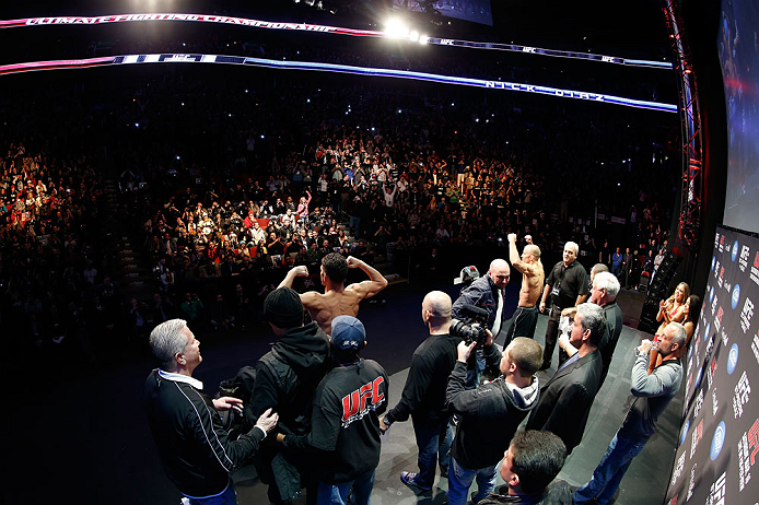 MONTREAL, QC - MARCH 15: (R-L) Opponents Georges St-Pierre and Nick Diaz pose for the fans during the UFC 158 weigh-in at Bell Centre on March 15, 2013 in Montreal, Quebec, Canada. (Photo by Josh Hedges/Zuffa LLC/Zuffa LLC via Getty Images)