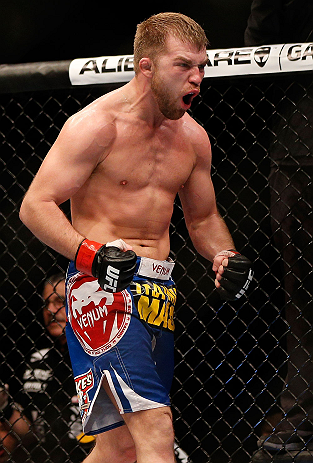 NEWARK, NJ - APRIL 27: Bryan Caraway reacts after defeating Johny Bedford in their bantamweight fight during the UFC 159 event at the Prudential Center on April 27, 2013 in Newark, New Jersey. (Photo by Josh Hedges/Zuffa LLC/Zuffa LLC via Getty Images)