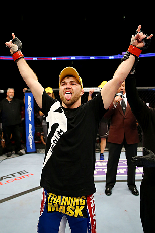 NEWARK, NJ - APRIL 27: Bryan Caraway celebrates winning by submission (guillotine choke) against Johnny Bedford in their bantamweight bout during the UFC 159 event at the Prudential Center on April 27, 2013 in Newark, New Jersey. (Photo by Al Bello/Zuff