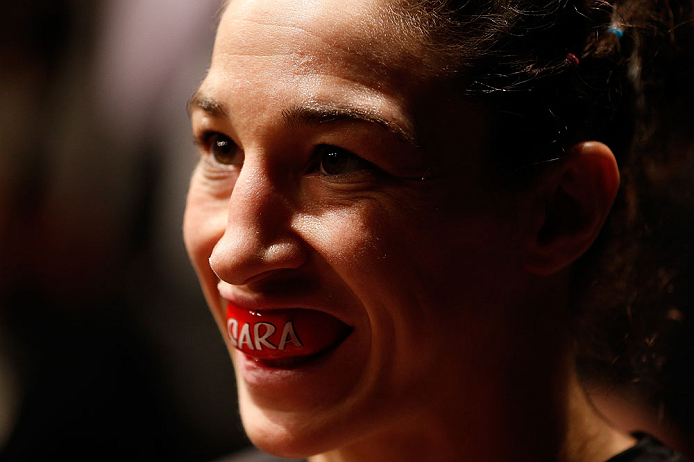 NEWARK, NJ - APRIL 27: Sara McMann prepares to enter the Octagon before her bantamweight fight against Sheila Gaff during the UFC 159 event at the Prudential Center on April 27, 2013 in Newark, New Jersey. (Photo by Josh Hedges/Zuffa LLC/Zuffa LLC via
