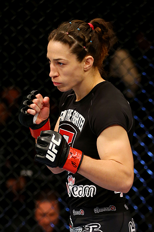 NEWARK, NJ - APRIL 27: Sara McMann walks to the center of the octagon to fight against Sheila Gaff in their women's bantamweight bout during the UFC 159 event at the Prudential Center on April 27, 2013 in Newark, New Jersey. (Photo by Al Bello/Zuffa LLC