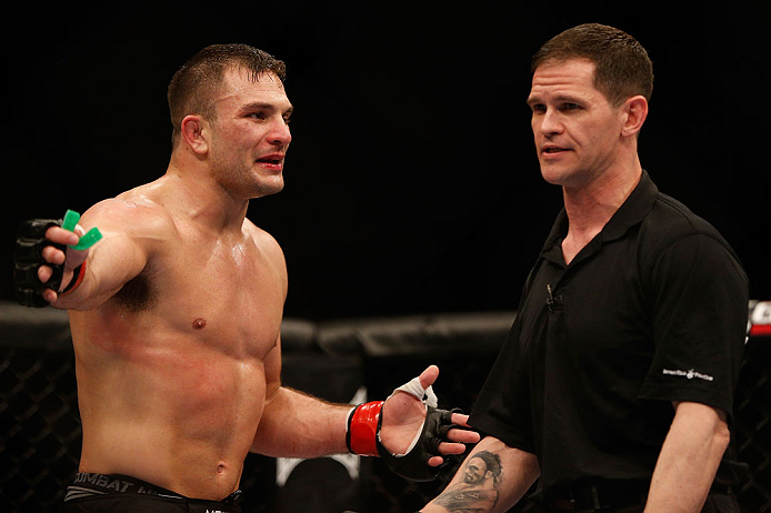 NEWARK, NJ - APRIL 27: (L-R) Gian Villante argues with referee Kevin Mulholland after a controversial stoppage in his light heavyweight fight against Ovince Saint Preux during the UFC 159 event at the Prudential Center on April 27, 2013 in Newark, New J
