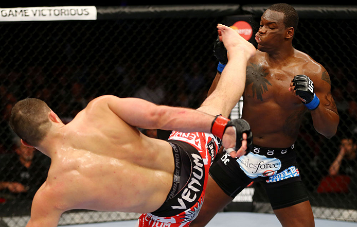 NEWARK, NJ - APRIL 27: Gian Villante (L) kicks Ovince Saint Preux (R) in their light heavyweight bout during the UFC 159 event at the Prudential Center on April 27, 2013 in Newark, New Jersey. (Photo by Al Bello/Zuffa LLC/Zuffa LLC Via Getty Images)