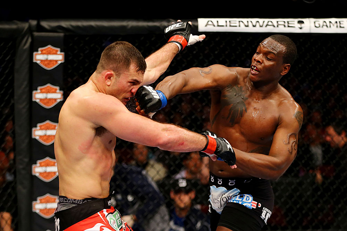 NEWARK, NJ - APRIL 27: Ovince Saint Preux (R) punches Gian Villante (L) in their light heavyweight bout during the UFC 159 event at the Prudential Center on April 27, 2013 in Newark, New Jersey. (Photo by Al Bello/Zuffa LLC/Zuffa LLC Via Getty Images)