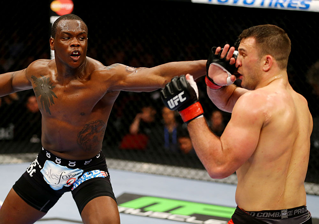 NEWARK, NJ - APRIL 27: (L-R) Ovince Saint Preux throws a punch against Gian Villante in their light heavyweight bout during the UFC 159 event at the Prudential Center on April 27, 2013 in Newark, New Jersey. (Photo by Al Bello/Zuffa LLC/Zuffa LLC Via Ge