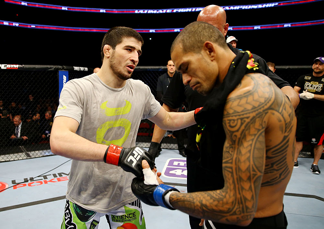 NEWARK, NJ - APRIL 27: (L-R) Rustam Khabilov of Russia shakes hands with Yancy Medeiros after winning by TKO (Thumb Injury) during their lightweight bout during the UFC 159 event at the Prudential Center on April 27, 2013 in Newark, New Jersey. (Photo b
