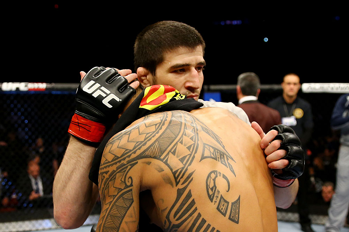 NEWARK, NJ - APRIL 27: (L-R) Rustam Khabilov of Russia is congratulated by Yancy Medeiros after winning by TKO (Thumb Injury) during their lightweight bout during the UFC 159 event at the Prudential Center on April 27, 2013 in Newark, New Jersey. (Photo