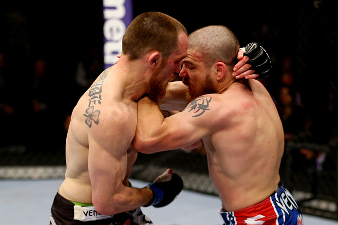 NEWARK, NJ - APRIL 27: Pat Healy (L) battles against Jim Miller (R) in their lightweight bout during the UFC 159 event at the Prudential Center on April 27, 2013 in Newark, New Jersey. (Photo by Al Bello/Zuffa LLC/Zuffa LLC Via Getty Images)