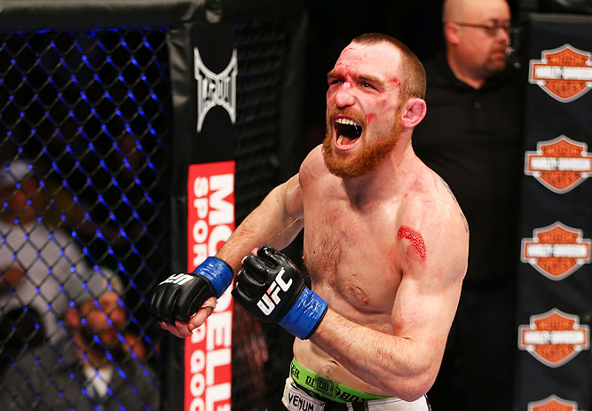 NEWARK, NJ - APRIL 27: Pat Healy celebrates defeating Jim Miller by Technical Submission (Rear-Naked Choke) in their lightweight bout during the UFC 159 event at the Prudential Center on April 27, 2013 in Newark, New Jersey. (Photo by Al Bello/Zuffa LLC