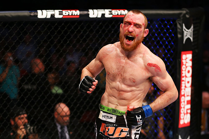 NEWARK, NJ - APRIL 27: Pat Healy celebrates defeating Jim Miller by Technical Submission (Rear-Naked Choke) in their lightweight bout during the UFC 159 event at the Prudential Center on April 27, 2013 in Newark, New Jersey. (Photo by Al Bello/Zuffa LLC