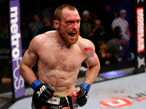NEWARK, NJ - APRIL 27: Pat Healy celebrates defeating Jim Miller by Technical Submission (Rear-Naked Choke) in their lightweight bout during the UFC 159 event at the Prudential Center on April 27, 2013 in Newark, New Jersey. (Photo by Al Bello/Zuffa LLC