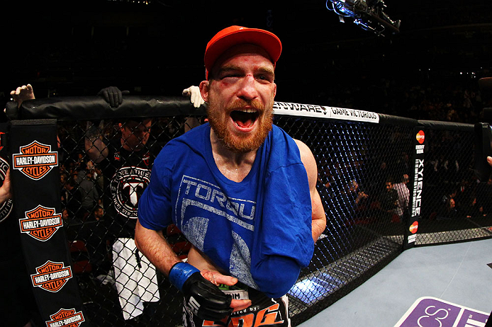 NEWARK, NJ - APRIL 27: Pat Healy celebrates defeating Jim Miller by Technical Submission (rear-naked choke) in their lightweight bout during the UFC 159 event at the Prudential Center on April 27, 2013 in Newark, New Jersey. (Photo by Al Bello/Zuffa LLC