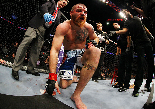NEWARK, NJ - APRIL 27: Jim Miller stands up after losing by TKO (rear-naked choke) to Pat Healy in the third round of their lightweight bout during the UFC 159 event at the Prudential Center on April 27, 2013 in Newark, New Jersey. (Photo by Al Bello/Zuf