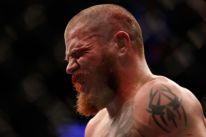 NEWARK, NJ - APRIL 27: A dejected Jim Miller leaves the Octagon after his loss to Pat Healy in their lightweight fight during the UFC 159 event at the Prudential Center on April 27, 2013 in Newark, New Jersey. (Photo by Josh Hedges/Zuffa LLC/Zuffa LLC