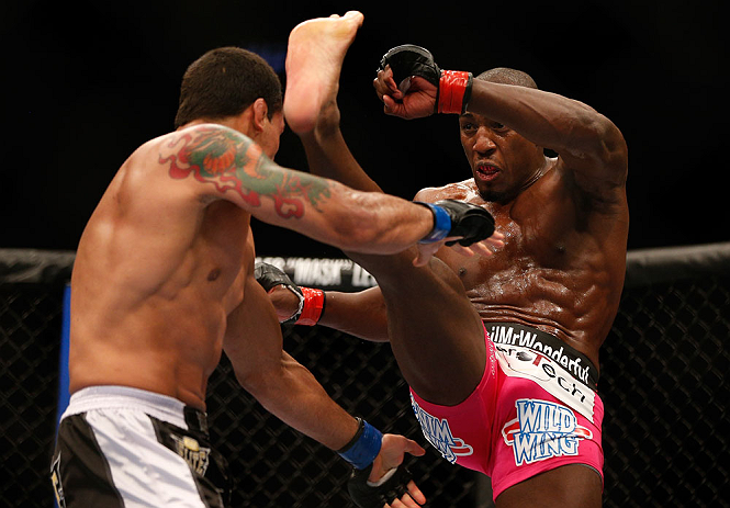 NEWARK, NJ - APRIL 27: (R-L) Phil Davis kicks Vinny Magalhaes in their light heavyweight fight during the UFC 159 event at the Prudential Center on April 27, 2013 in Newark, New Jersey. (Photo by Josh Hedges/Zuffa LLC/Zuffa LLC via Getty Images)
