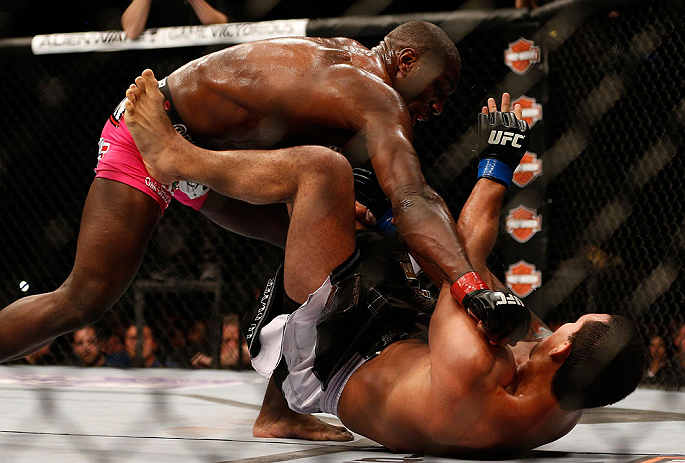 NEWARK, NJ - APRIL 27: (L-R) Phil Davis punches Vinny Magalhaes in their light heavyweight fight during the UFC 159 event at the Prudential Center on April 27, 2013 in Newark, New Jersey. (Photo by Josh Hedges/Zuffa LLC/Zuffa LLC via Getty Images)