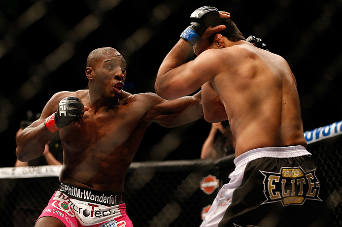 NEWARK, NJ - APRIL 27: (L-R) Phil Davis punches Vinny Magalhaes in their light heavyweight fight during the UFC 159 event at the Prudential Center on April 27, 2013 in Newark, New Jersey. (Photo by Josh Hedges/Zuffa LLC/Zuffa LLC via Getty Images)