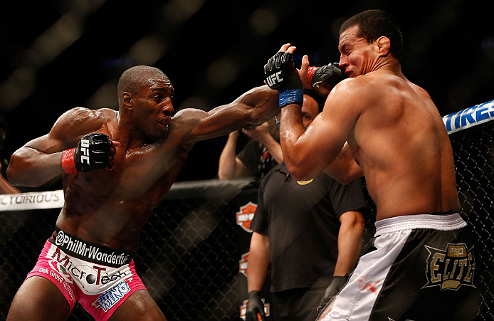NEWARK, NJ - APRIL 27: (L-R) Phil Davis punches Vinny Magalhaes in their light heavyweight fight during the UFC 159 event at the Prudential Center on April 27, 2013 in Newark, New Jersey. (Photo by Josh Hedges/Zuffa LLC/Zuffa LLC via Getty Images)