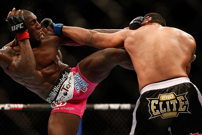 NEWARK, NJ - APRIL 27: (L-R) Phil Davis and Vinny Magalhaes trade strikes in their light heavyweight fight during the UFC 159 event at the Prudential Center on April 27, 2013 in Newark, New Jersey. (Photo by Josh Hedges/Zuffa LLC/Zuffa LLC via Getty Im