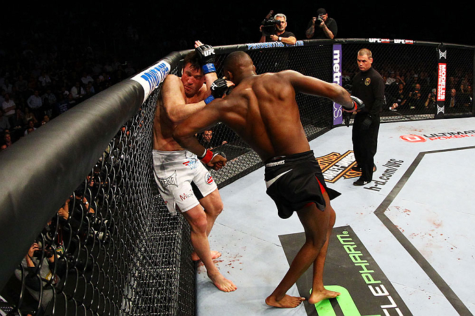 NEWARK, NJ - APRIL 27: Chael Sonnen defends himself against Jon Jones in their light heavyweight championship bout during the UFC 159 event at the Prudential Center on April 27, 2013 in Newark, New Jersey. (Photo by Al Bello/Zuffa LLC/Zuffa LLC Via Gett
