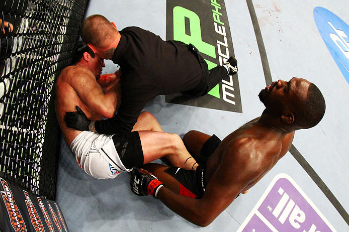 NEWARK, NJ - APRIL 27: Referee Keith Peterson ends the fight after Jon Jones knocked out Chael Sonnen to win their light heavyweight championship bout during the UFC 159 event at the Prudential Center on April 27, 2013 in Newark, New Jersey. (Photo by Al