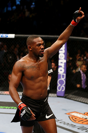NEWARK, NJ - APRIL 27: Jon Jones celebrates his knockout against Chael Sonnen to win their light heavyweight championship bout during the UFC 159 event at the Prudential Center on April 27, 2013 in Newark, New Jersey. (Photo by Al Bello/Zuffa LLC/Zuffa