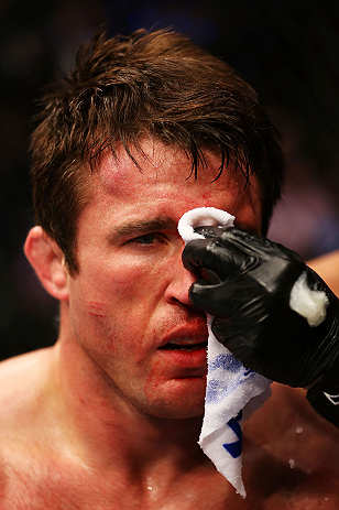 NEWARK, NJ - APRIL 27: Chael Sonnen is tended to after losing to Jon Jones by knockout in their light heavyweight championship bout during the UFC 159 event at the Prudential Center on April 27, 2013 in Newark, New Jersey. (Photo by Al Bello/Zuffa LLC/Zu