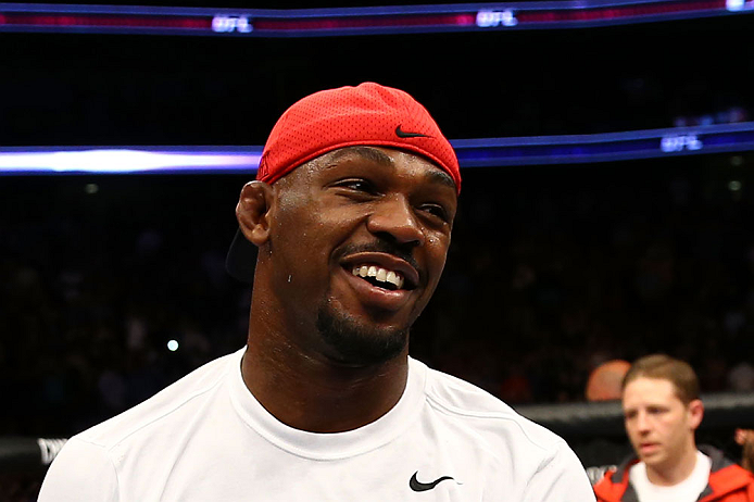 NEWARK, NJ - APRIL 27: Jon Jones smiles as Pat Healy is announced winner by knockout against Chael Sonnen after their light heavyweight championship bout during the UFC 159 event at the Prudential Center on April 27, 2013 in Newark, New Jersey. (Photo b