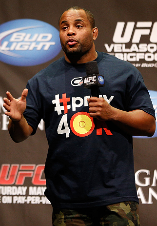 LAS VEGAS, NV - MAY 24: UFC heavyweight contender and former Oklahoma State and Olympic wrestling standout Daniel Cormier interacts with fans during a Q&A session before the UFC 160 weigh-in at the MGM Grand Garden Arena on May 24, 2013 in Las Vegas, Ne