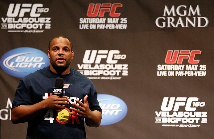 LAS VEGAS, NV - MAY 24: UFC heavyweight contender and former Oklahoma State and Olympic wrestling standout Daniel Cormier interacts with fans during a Q&A session before the UFC 160 weigh-in at the MGM Grand Garden Arena on May 24, 2013 in Las Vegas, Ne