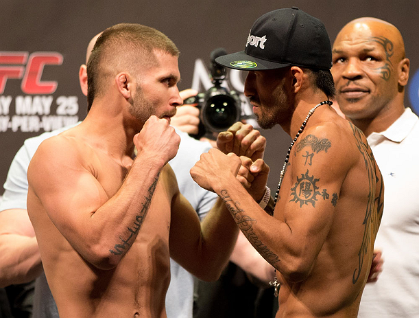 LAS VEGAS, NV - MAY 24: (L-R) Opponents Jeremy Stephens and Estevan Payan face off during the UFC 160 weigh-in at the MGM Grand Garden Arena on May 24, 2013 in Las Vegas, Nevada. (Photo by Josh Hedges/Zuffa LLC/Zuffa LLC via Getty Images)