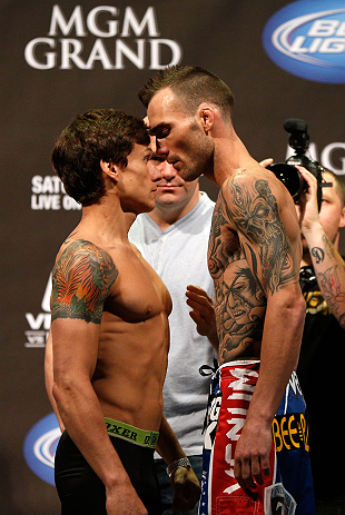 LAS VEGAS, NV - MAY 24: (L-R) Opponents Brian Bowles and George Roop face off during the UFC 160 weigh-in at the MGM Grand Garden Arena on May 24, 2013 in Las Vegas, Nevada. (Photo by Josh Hedges/Zuffa LLC/Zuffa LLC via Getty Images)